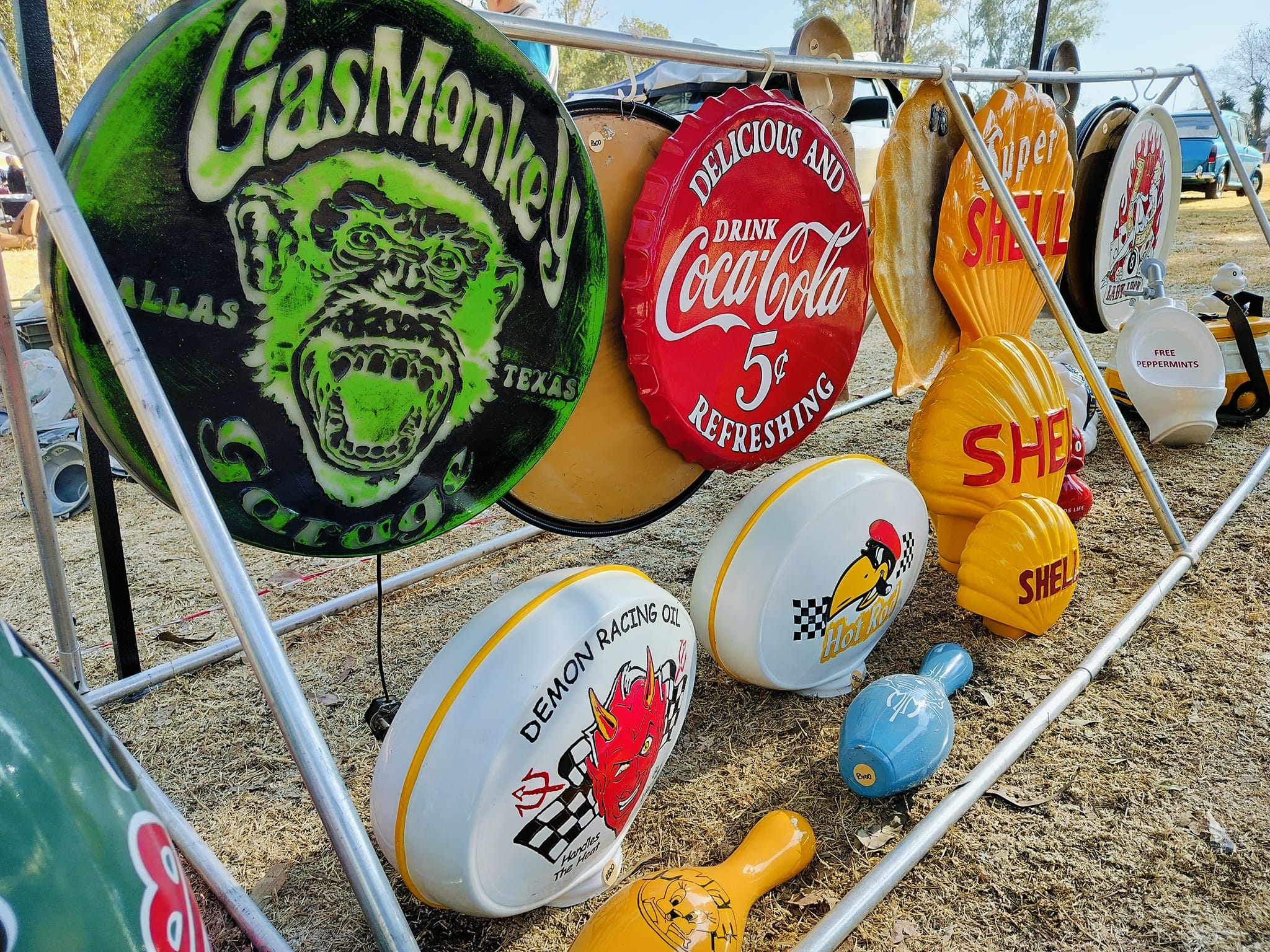 Outdoor display of handcrafted retro fiberglass signs