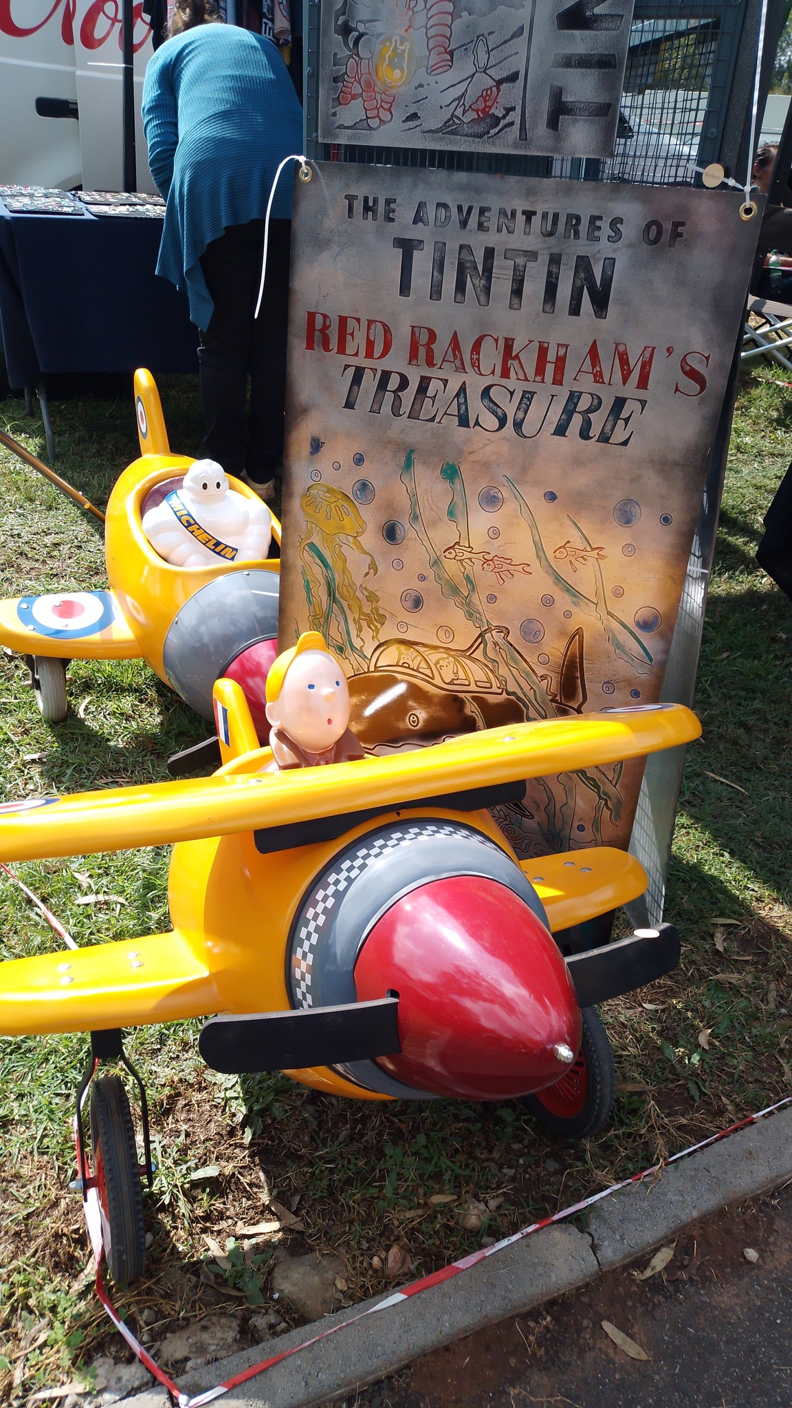 Yellow plane display with a custom illustrated adventure panel